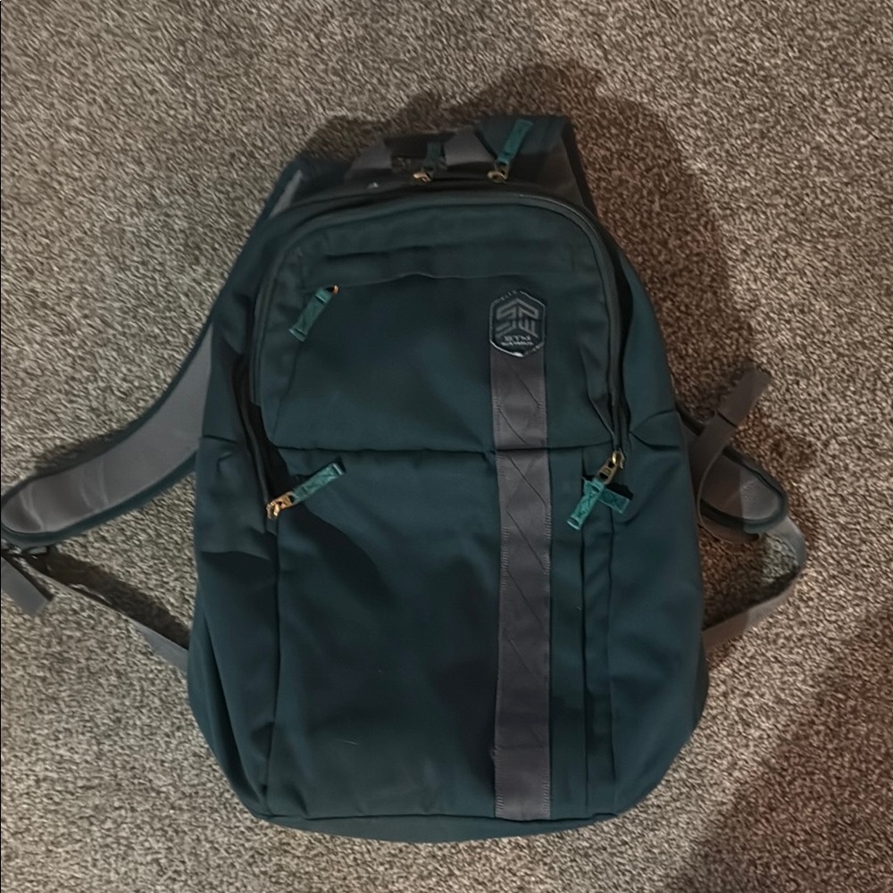 Green and Gray Modern Backpack with Urban Aesthetic